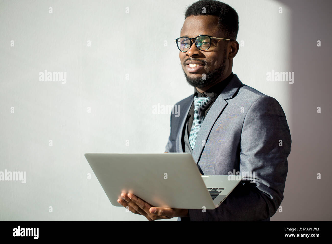 African coworker wearing glasses hi-res stock photography and images ...
