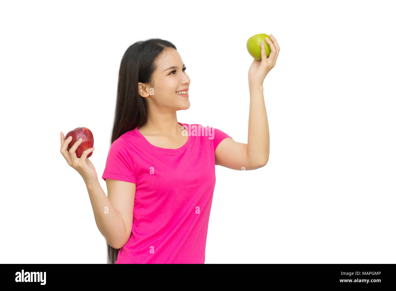 Health girl show red and green apple with smile face isolated on white background, healthy eating food concept Stock Photo