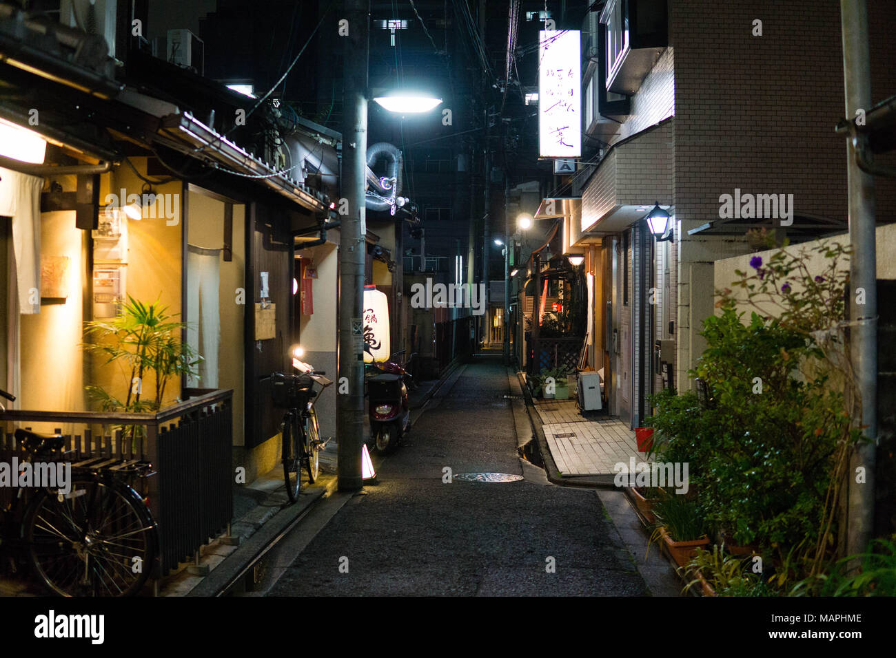 Side alley at Night in Tokyo, Japan Stock Photo