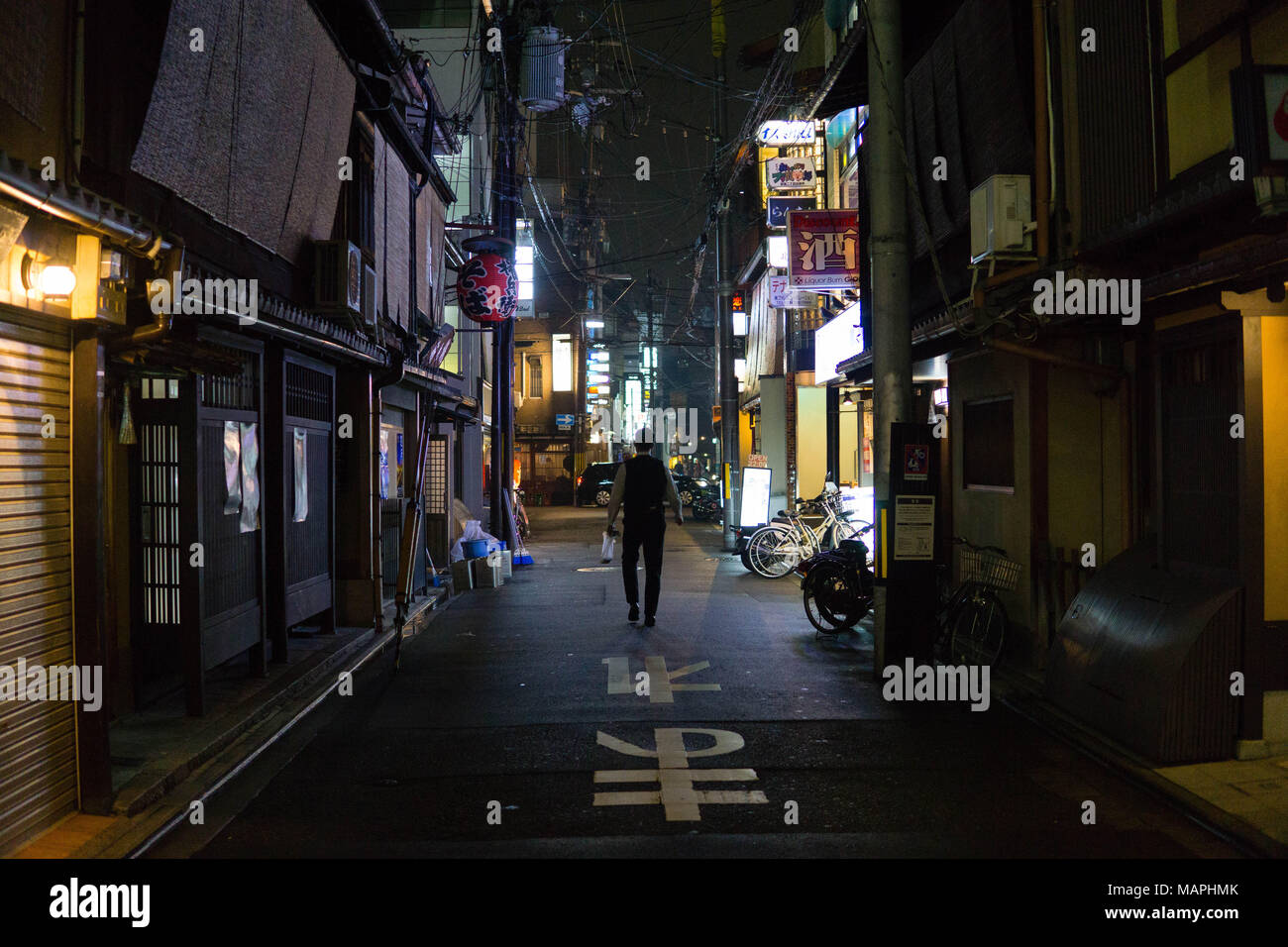 Man walking in Gion at Night Stock Photo