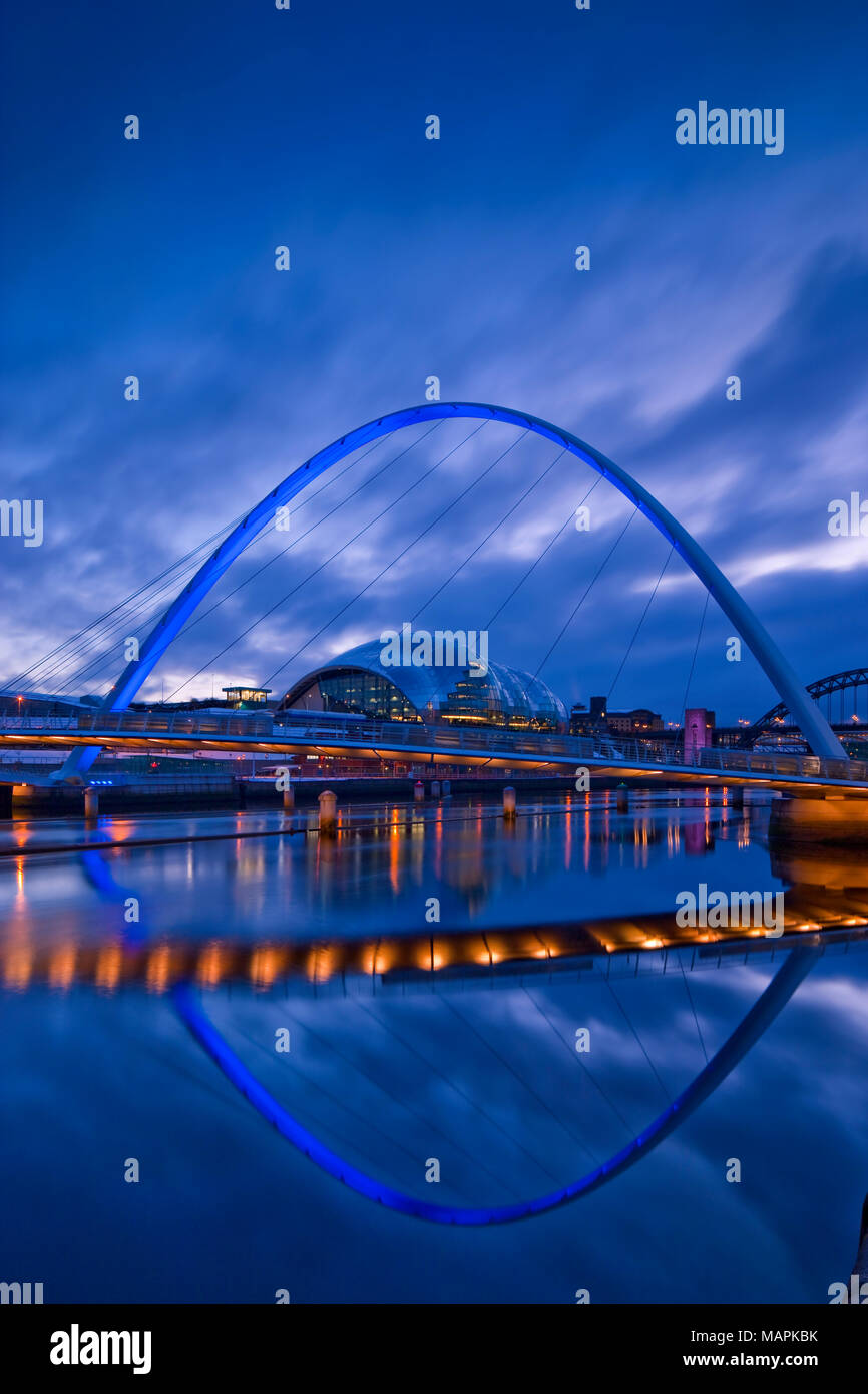 Millennium Bridge and The Sage Centre Gateshead Newcastle upon Tyne Northumberland England at twilight Stock Photo