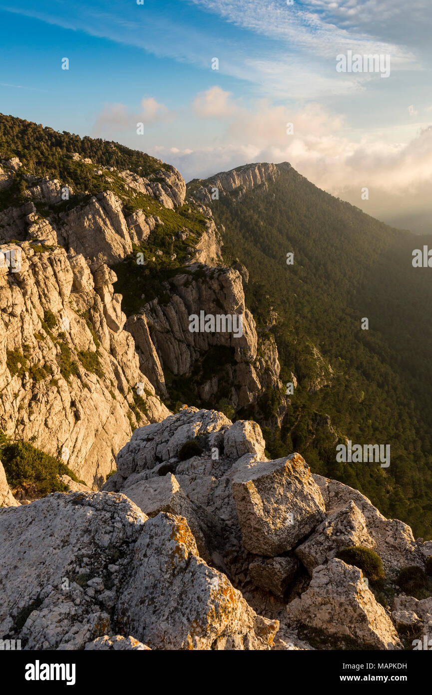 Rocky landscape at the ridge of a mountain during sunrise at Puertos de Beceite national Park, Spain Stock Photo