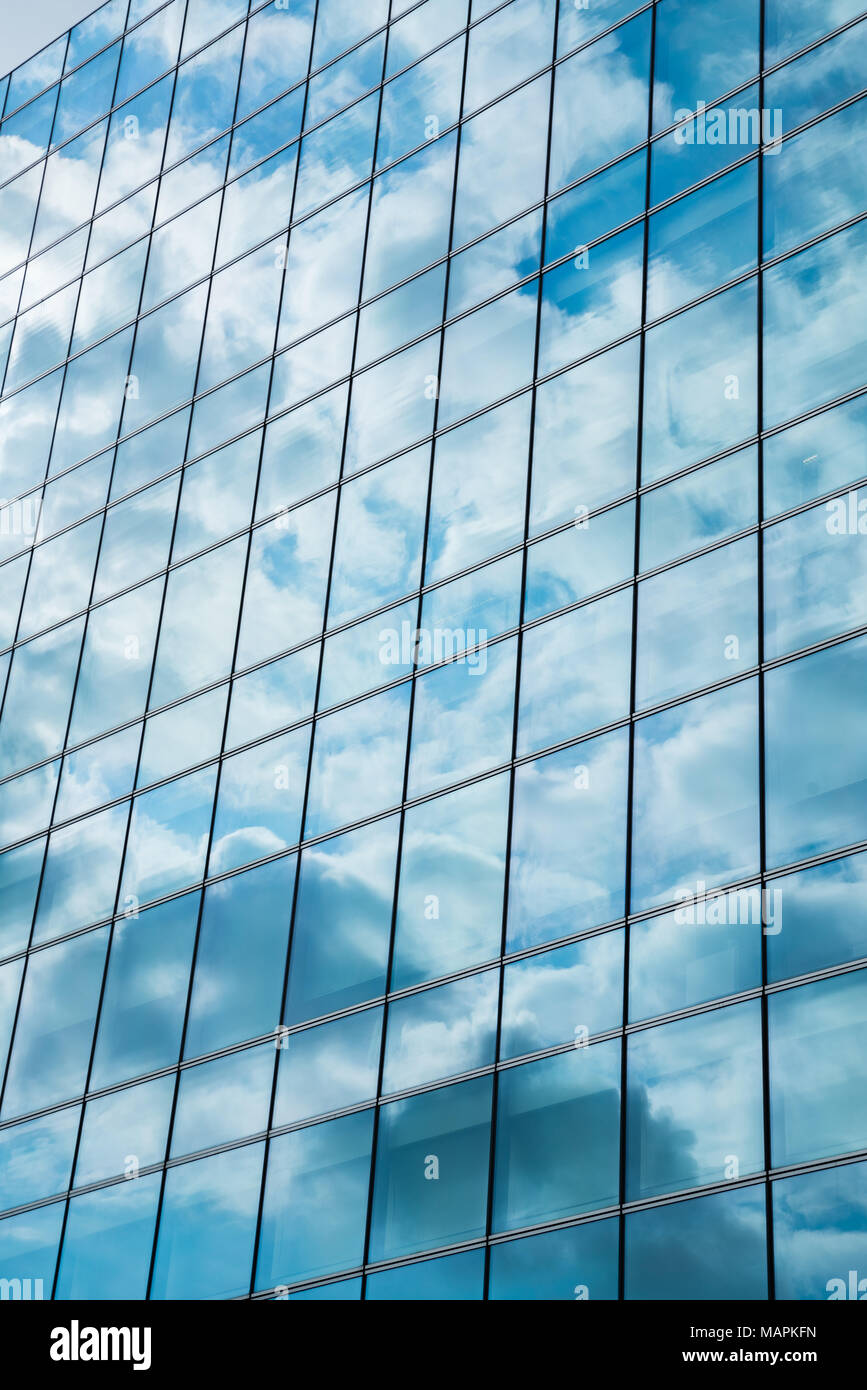 Glass facade of modern city high buildings, cloud reflection Stock ...