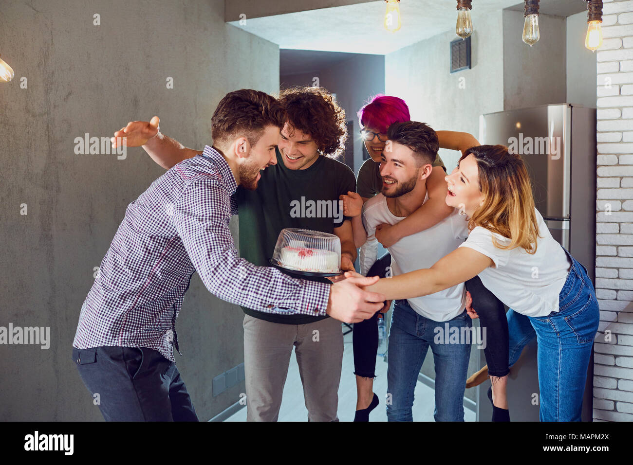 Group of friends of guests came to the other at the meeting.  Stock Photo