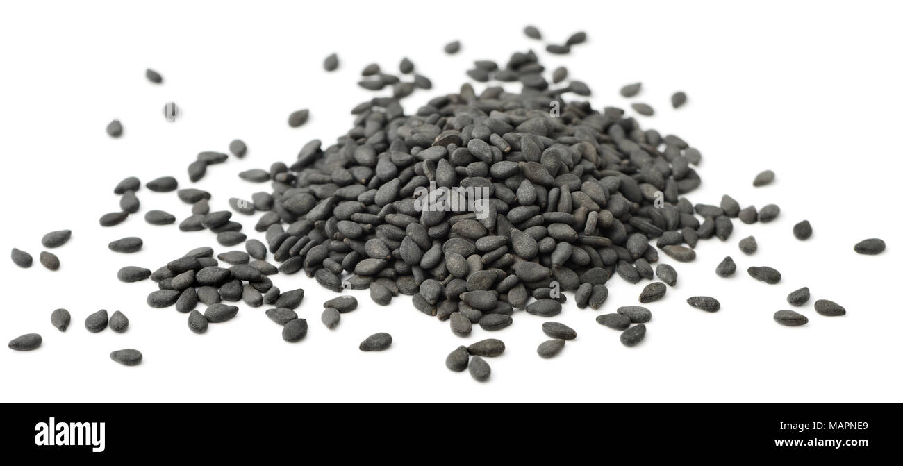 close up of black sesame seeds isolated on white background Stock Photo
