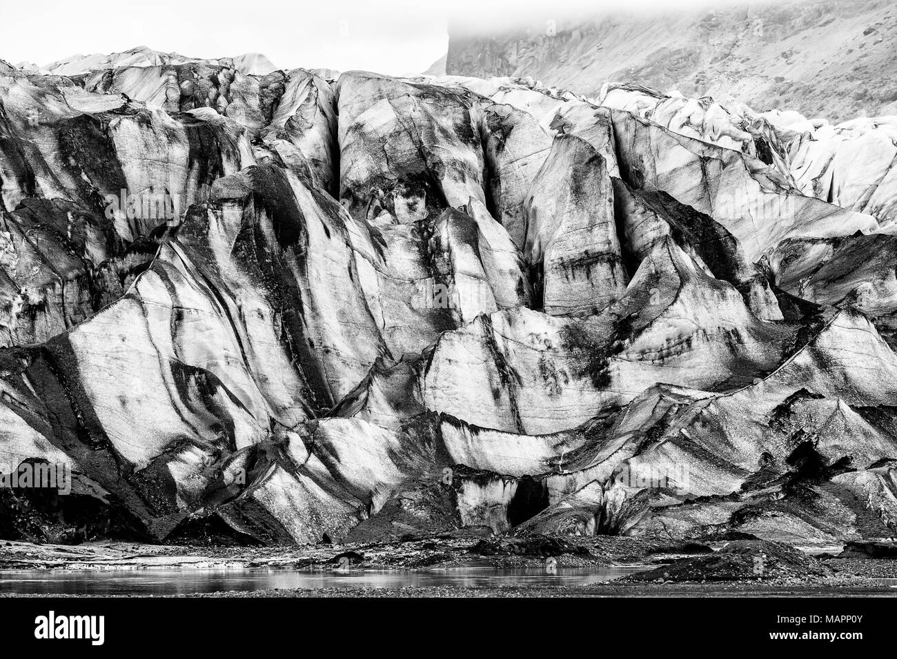 ash covered Skaftafellsjokull glacier, Vatnajokull National Park, Iceland Stock Photo