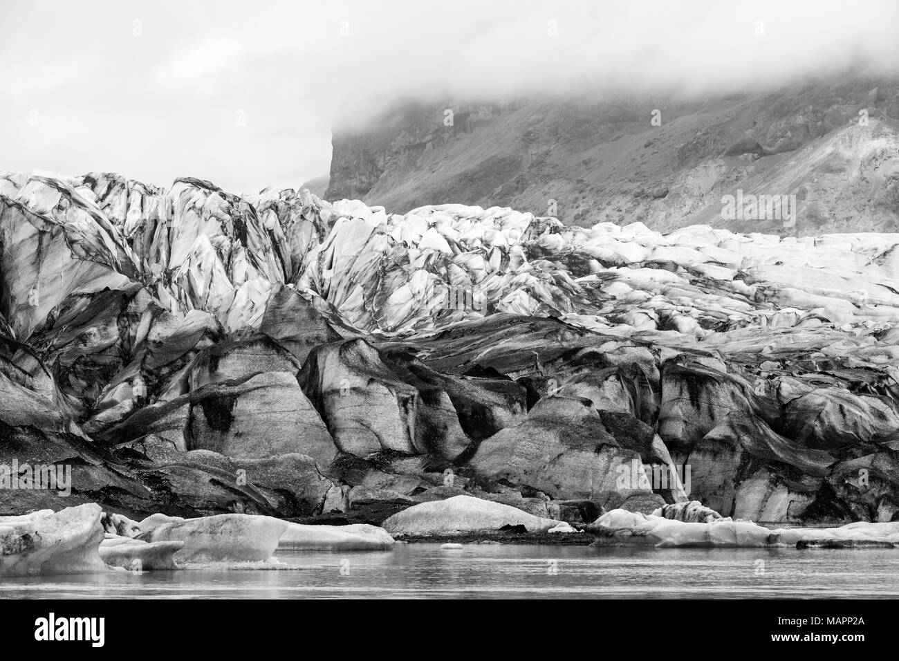 ash covered Skaftafellsjokull glacier, Vatnajokull National Park, Iceland Stock Photo