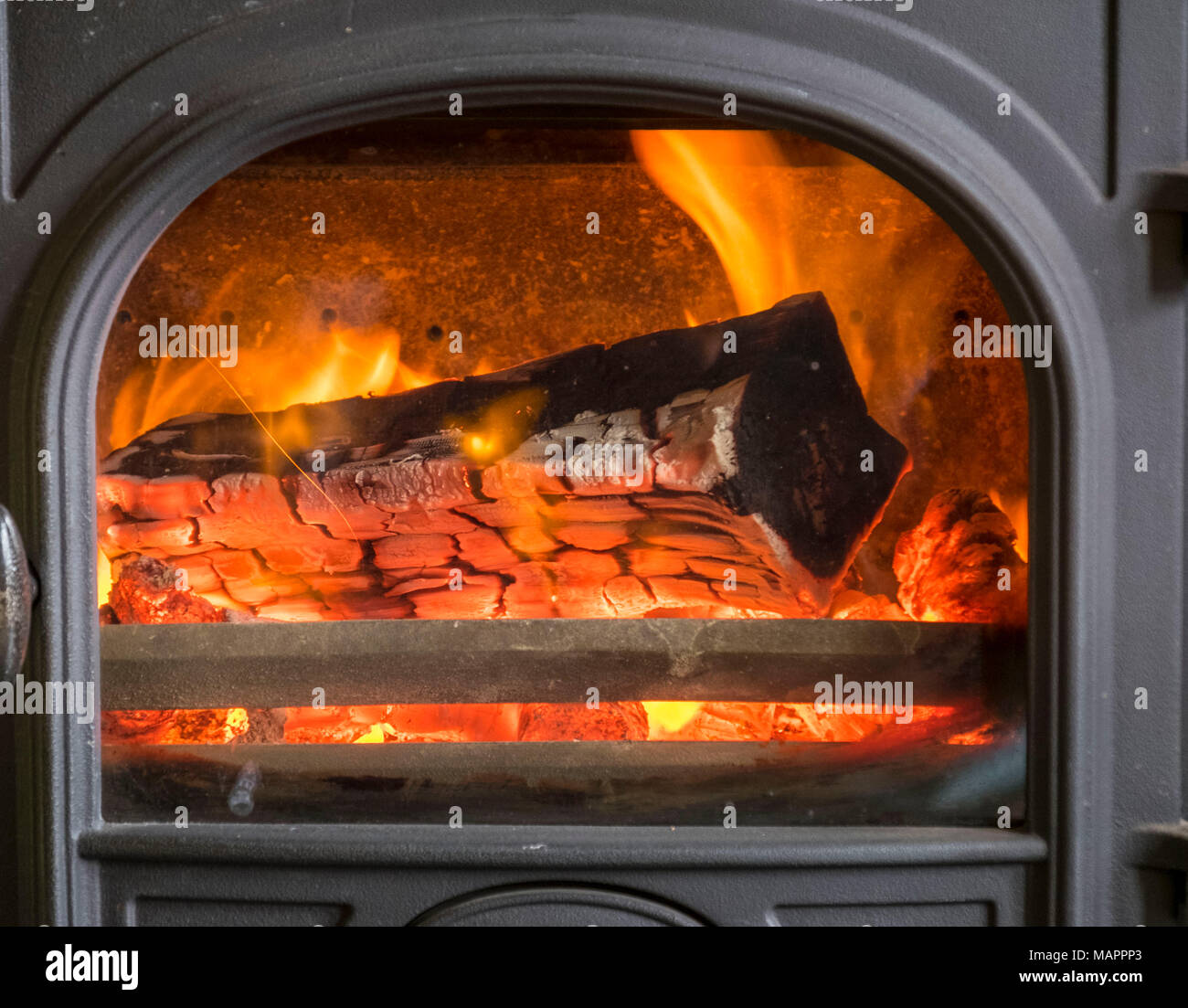 Logs burning in a log fire Stock Photo Alamy