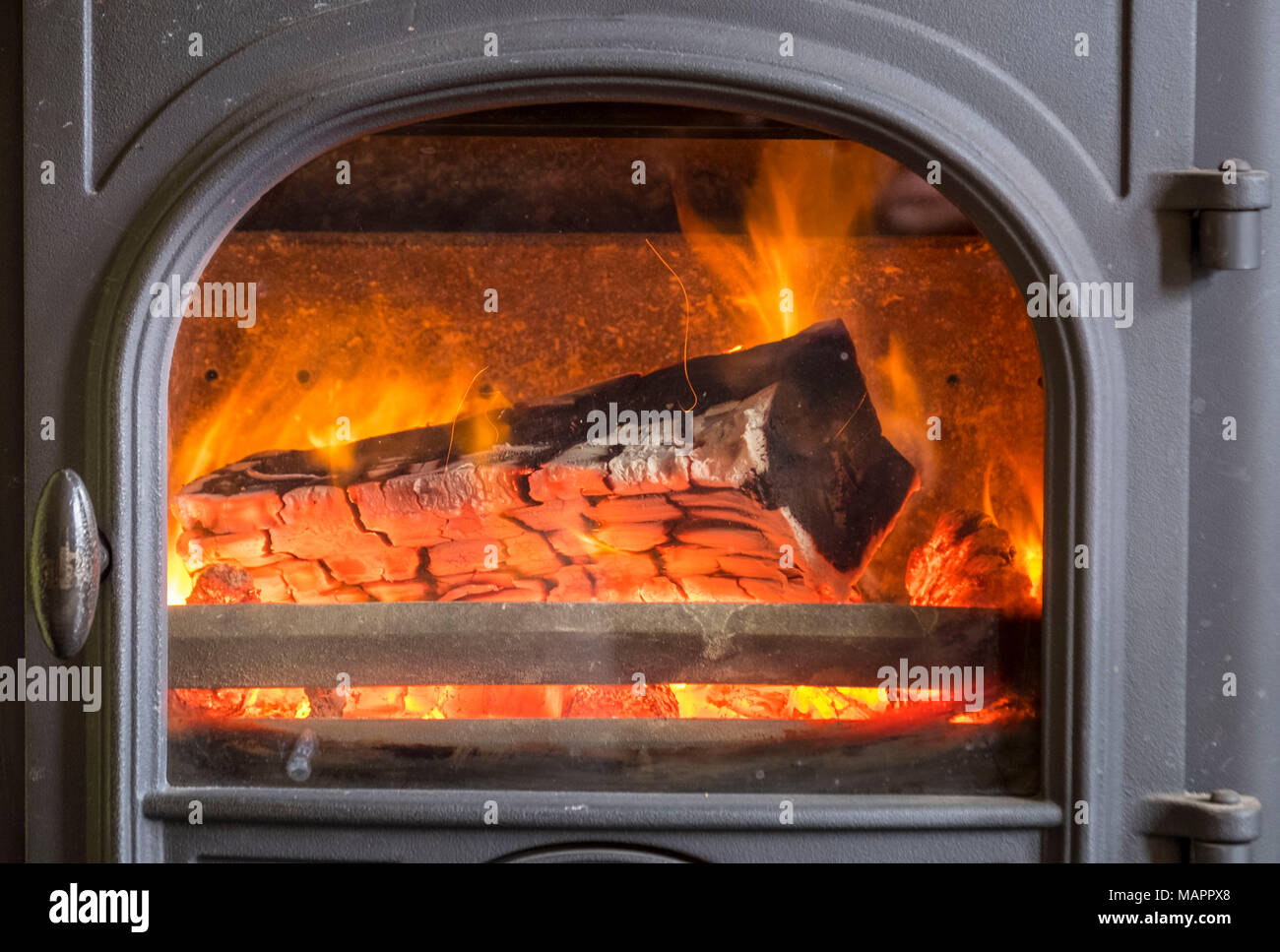 Logs burning in a log fire Stock Photo Alamy