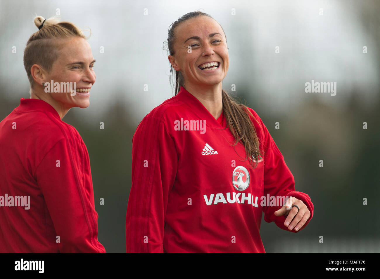 NEWPORT, WALES - APRIL 03: Jess Fishlock (L) and Natasha Harding laugh as the Wales women team train at Dragon Park ahead of the FIFA Women's World Cu Stock Photo