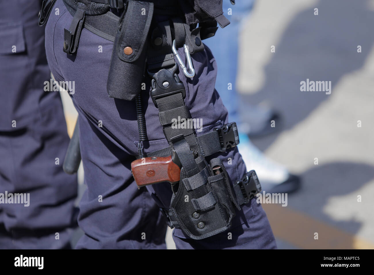 Details of the security kit of a police officer Stock Photo