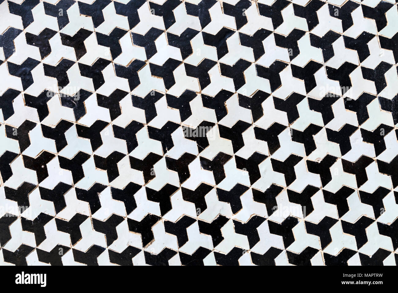 Black and white geometric Moroccan mosaic tiled wall, Palais El Mokri, Fes, Morocco Stock Photo