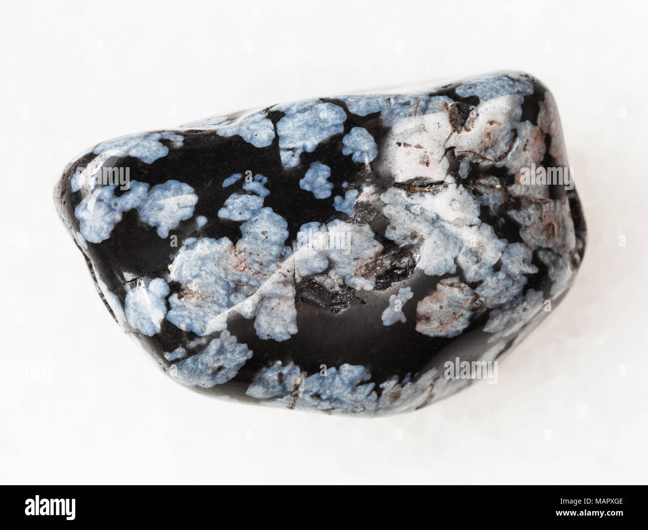 Macro Shooting Of Natural Mineral Rock Specimen Polished Snowflake Obsidian Gem Stone On White Marble Background From Usa Stock Photo Alamy