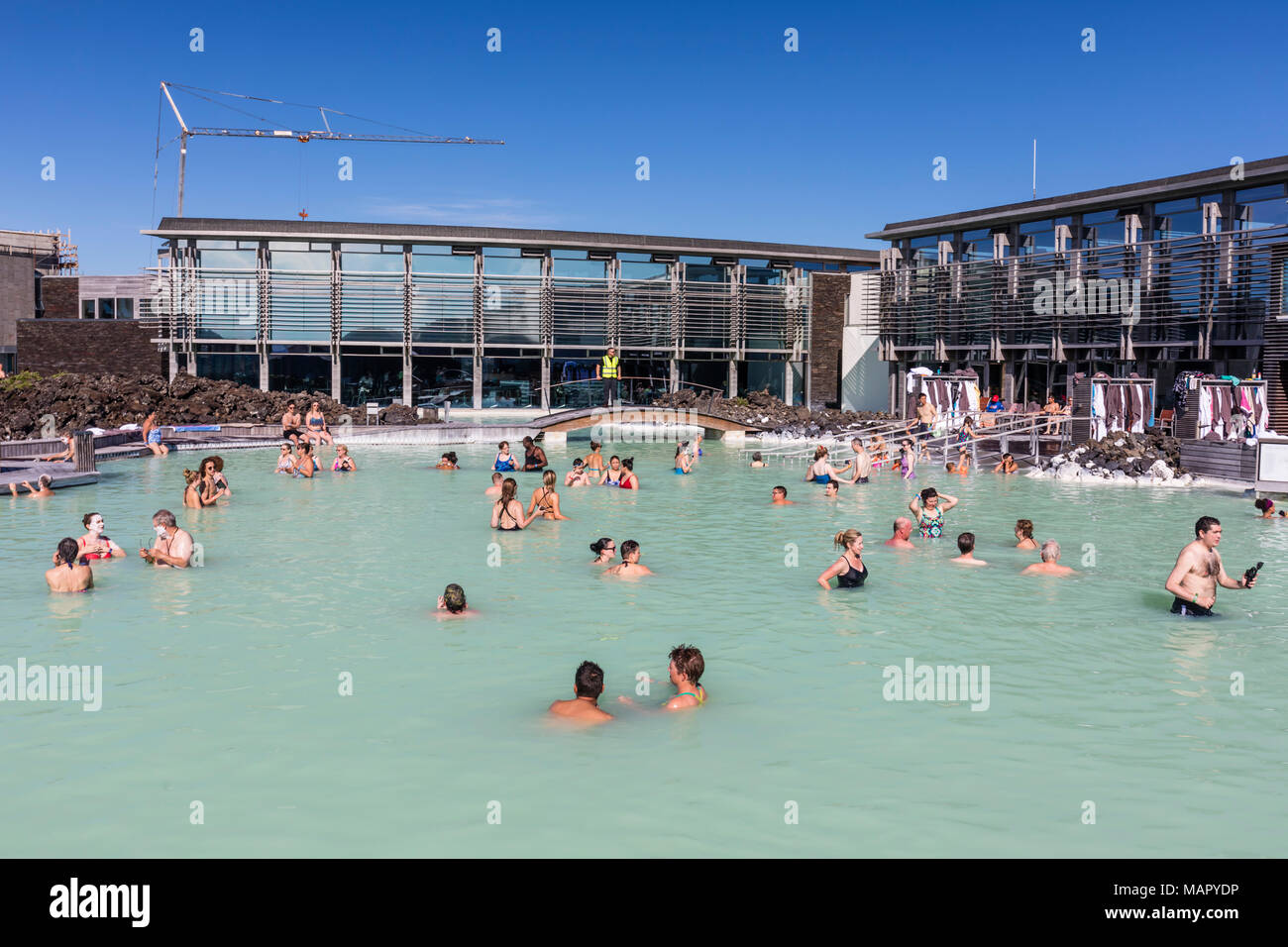 Guests enjoy the thermal waters of the Blue Lagoon (Blaa Ionid), Iceland, Polar Regions Stock Photo
