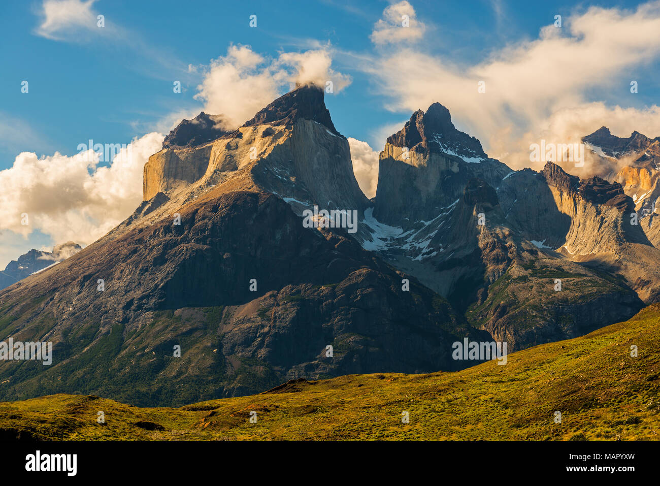 The majestic Cuernos del Paine granite peaks at sunset inside the Torres del Paine national park, Andes mountain range, Patagonia, Chile. Stock Photo