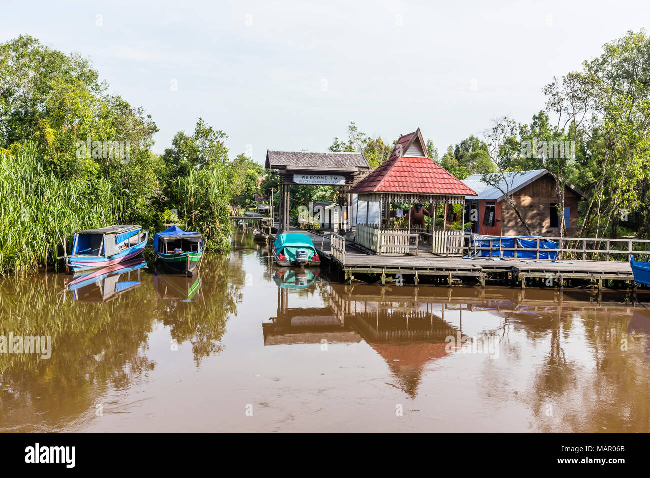 Small village on the Sekonyer River, Tanjung Puting National Park, Kalimantan, Borneo, Indonesia, Southeast Asia, Asia Stock Photo