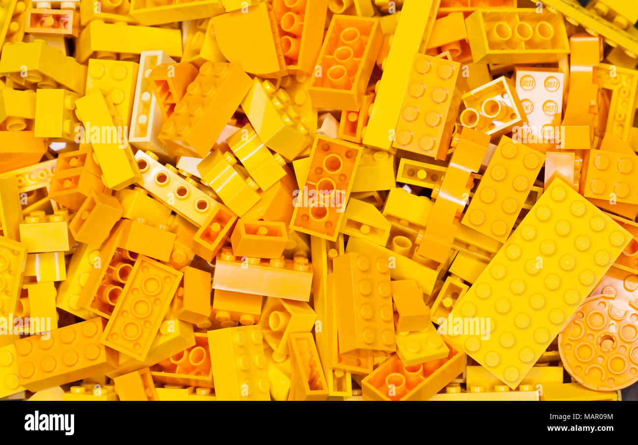 RUSSIAN, April 04, 2018. Yelloe Constructor Lego Classic. Set of colored cubes of lego in a box in bulk Stock Photo