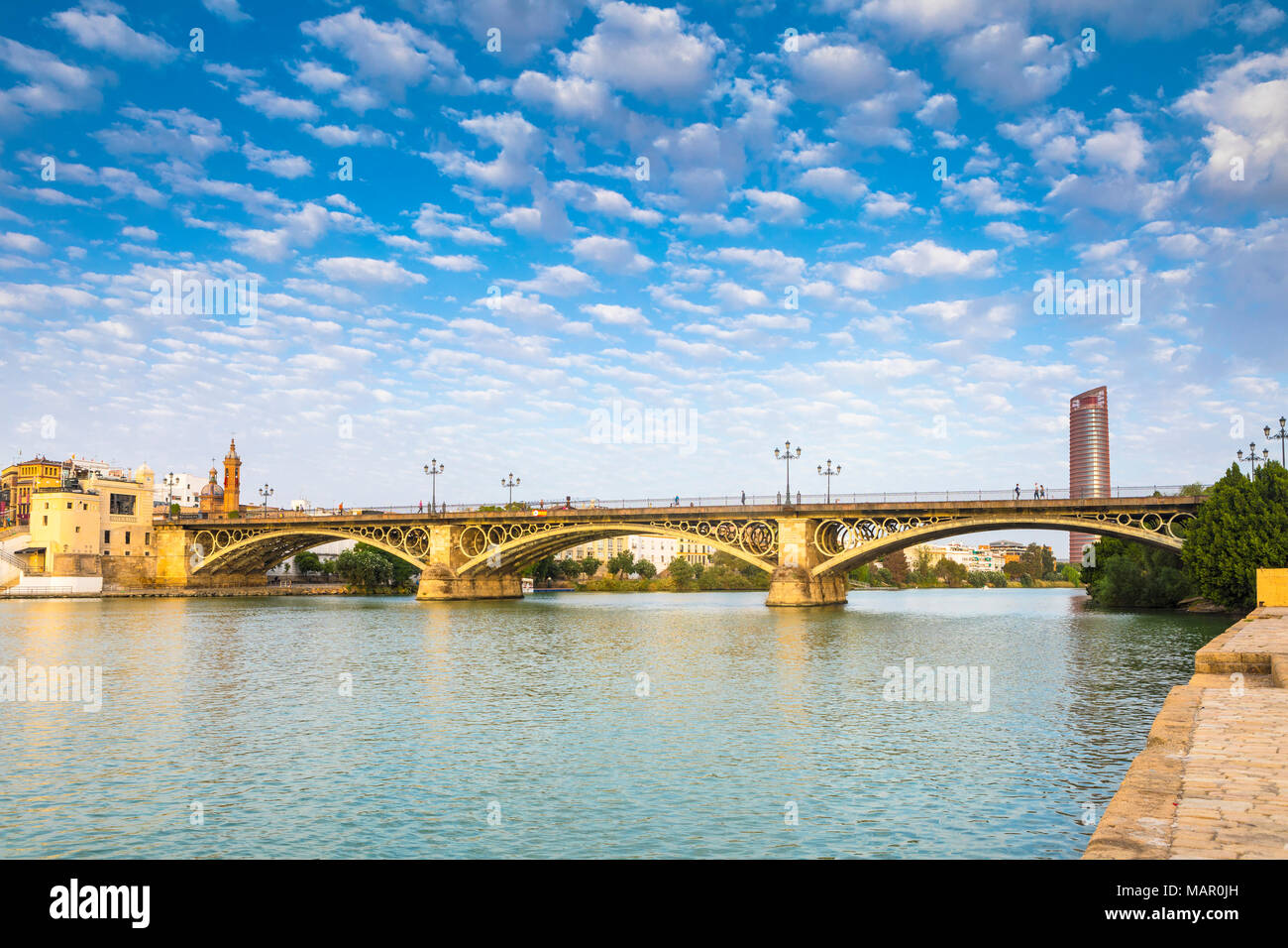 Puente de Isabel II (Puente de Triana) and the river Rio Guadalquivir, Seville, Andalusia, Spain, Europe Stock Photo
