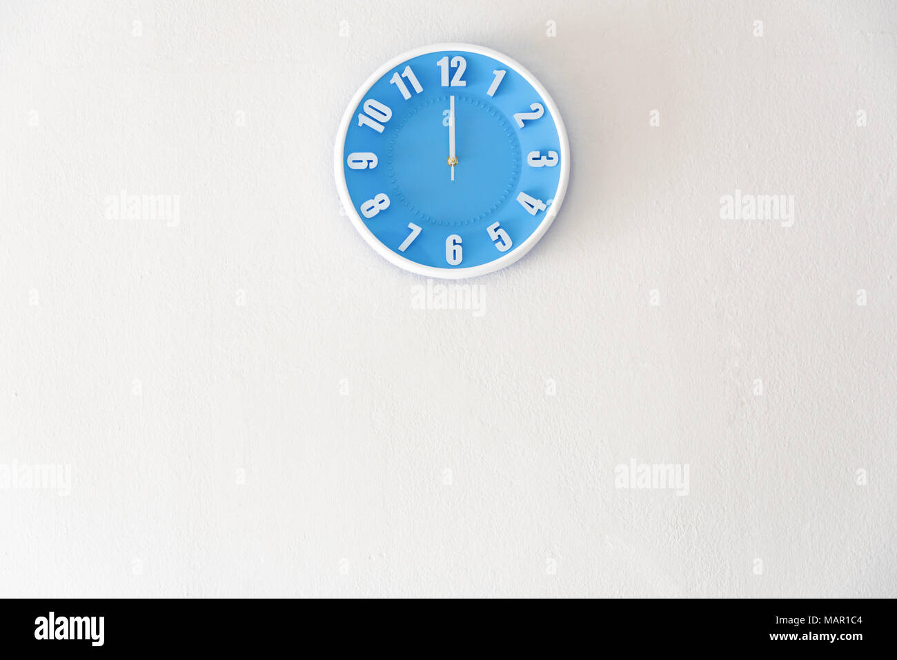 noon or midnight time with 12:00 clock on white concrete wall interior  background with copy space, message board concept. Noon is the lunch time ,  Mid Stock Photo - Alamy