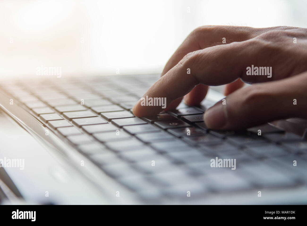 Hand typing Keyboard, online internet concept, selective focus Stock Photo