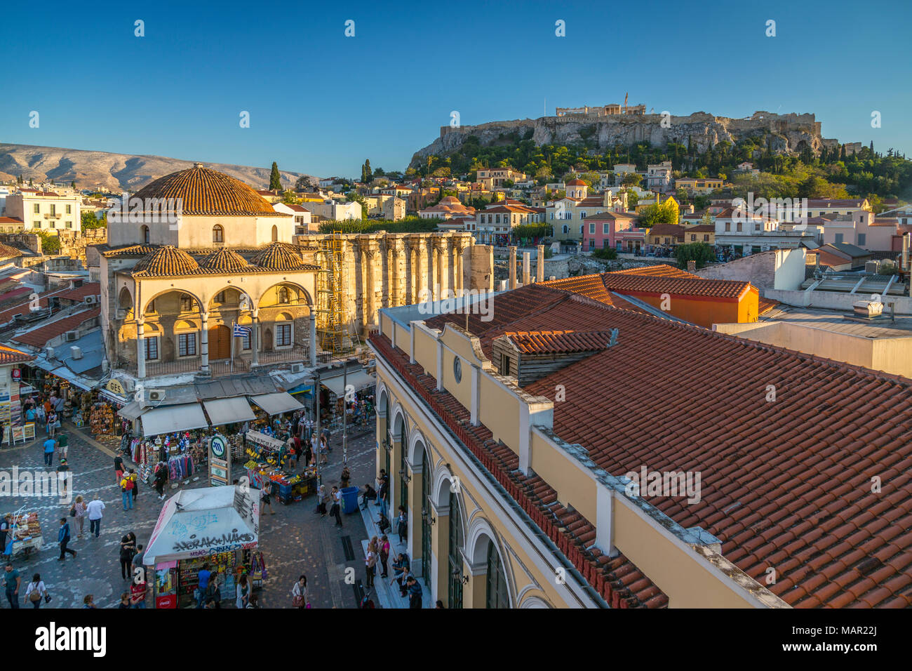Elevated view of Monastiraki Square with The Acropolis visible in background during late afternoon, Monastiraki District, Athens, Greece, Europe Stock Photo