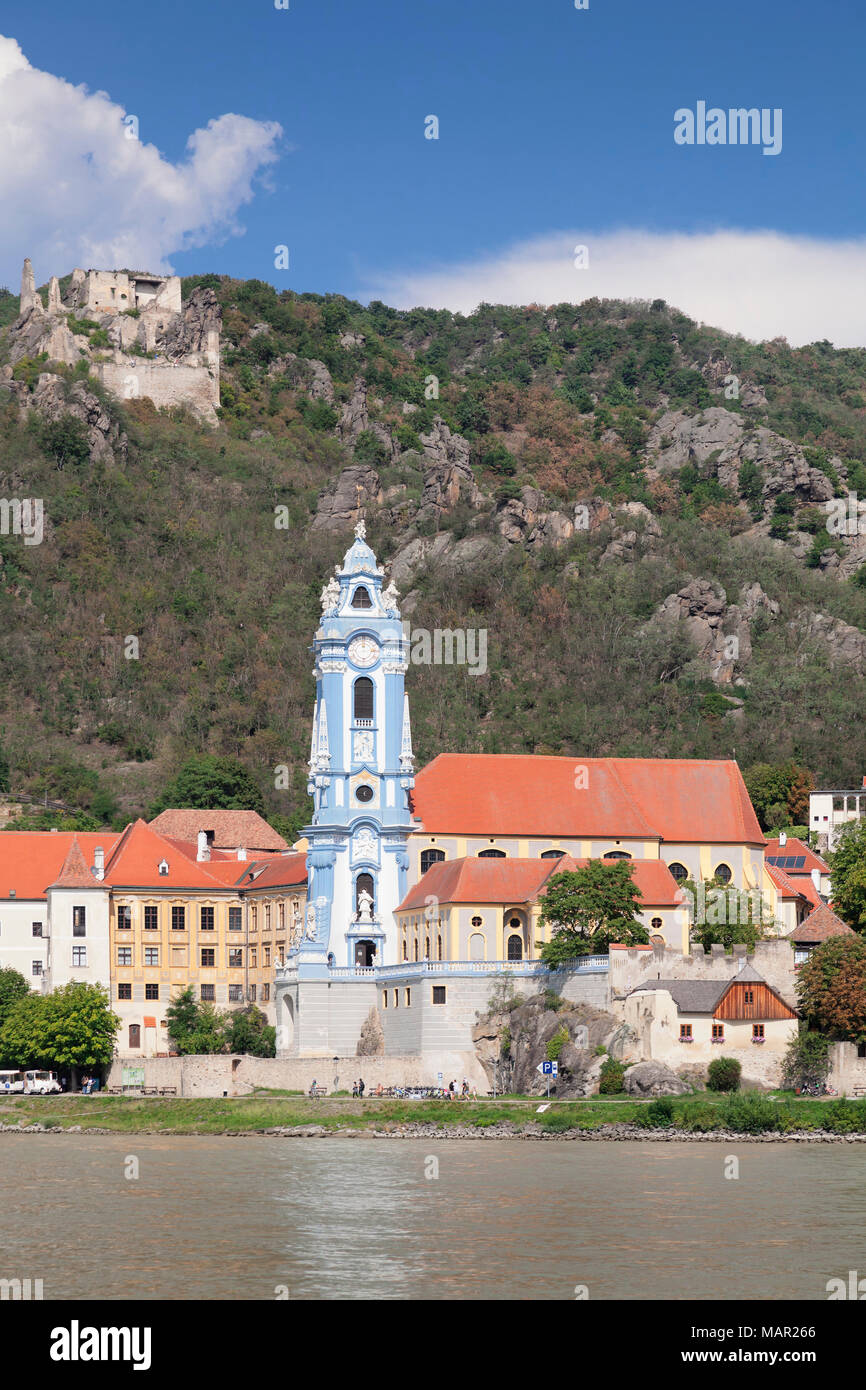 View over Danube River to Collegiate church and castle ruins, Durnstein, Wachau, Lower Austria, Europe Stock Photo