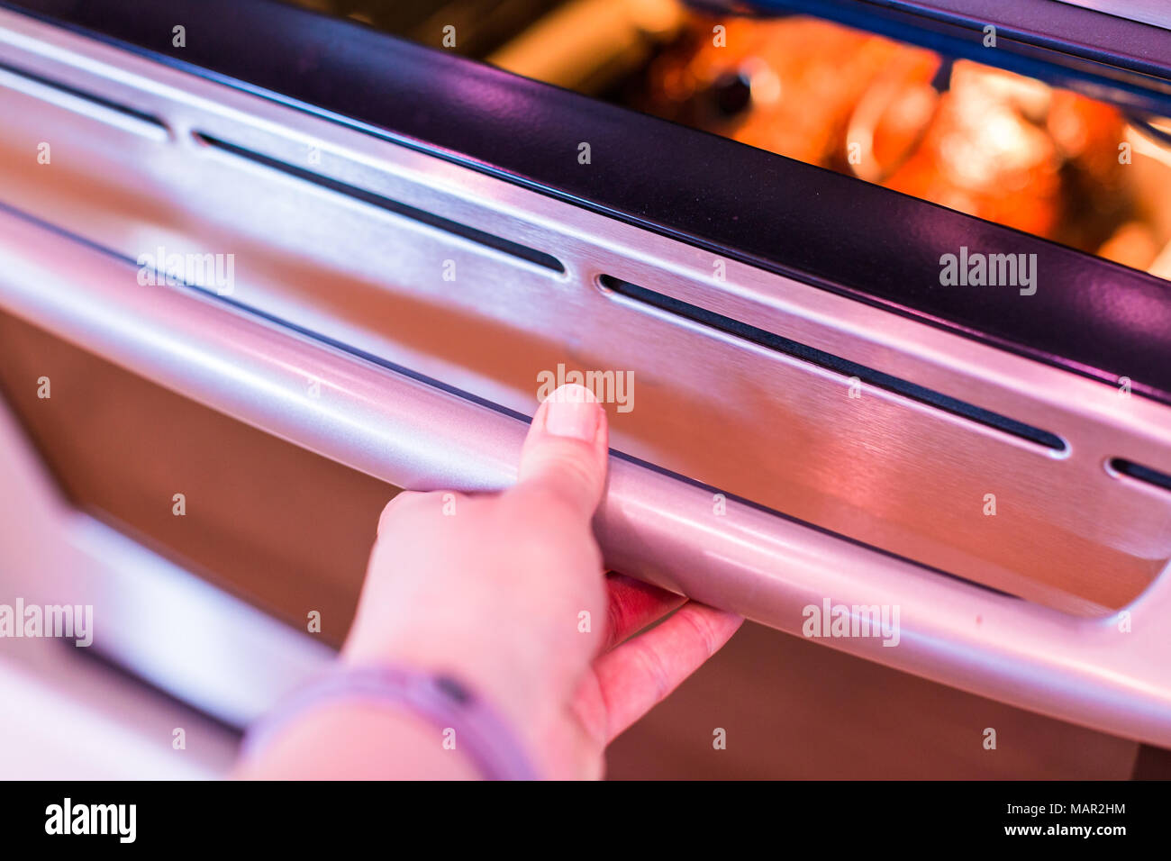 Cooking lamb roast in residential oven Stock Photo - Alamy