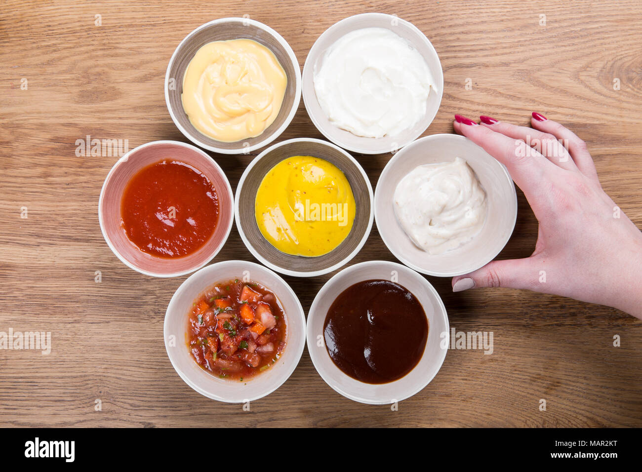 Set of sauces ketchup, mayonnaise, mustard soy sauce, bbq sauce, mustard grains and