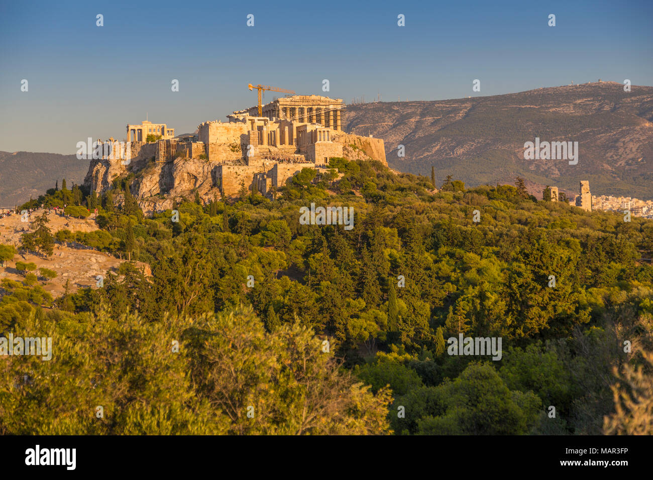 View of The Acropolis, UNESCO World Heritage Site, during late afternoon from Filopappou Hill, Athens, Greece, Europe Stock Photo