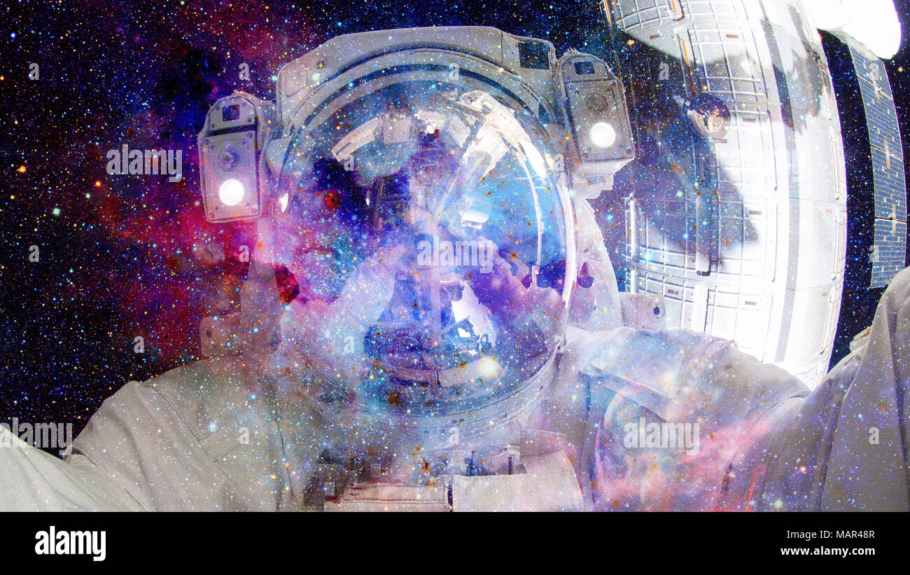 Astronaut in outer space. Science fiction art. Elements of this image ...