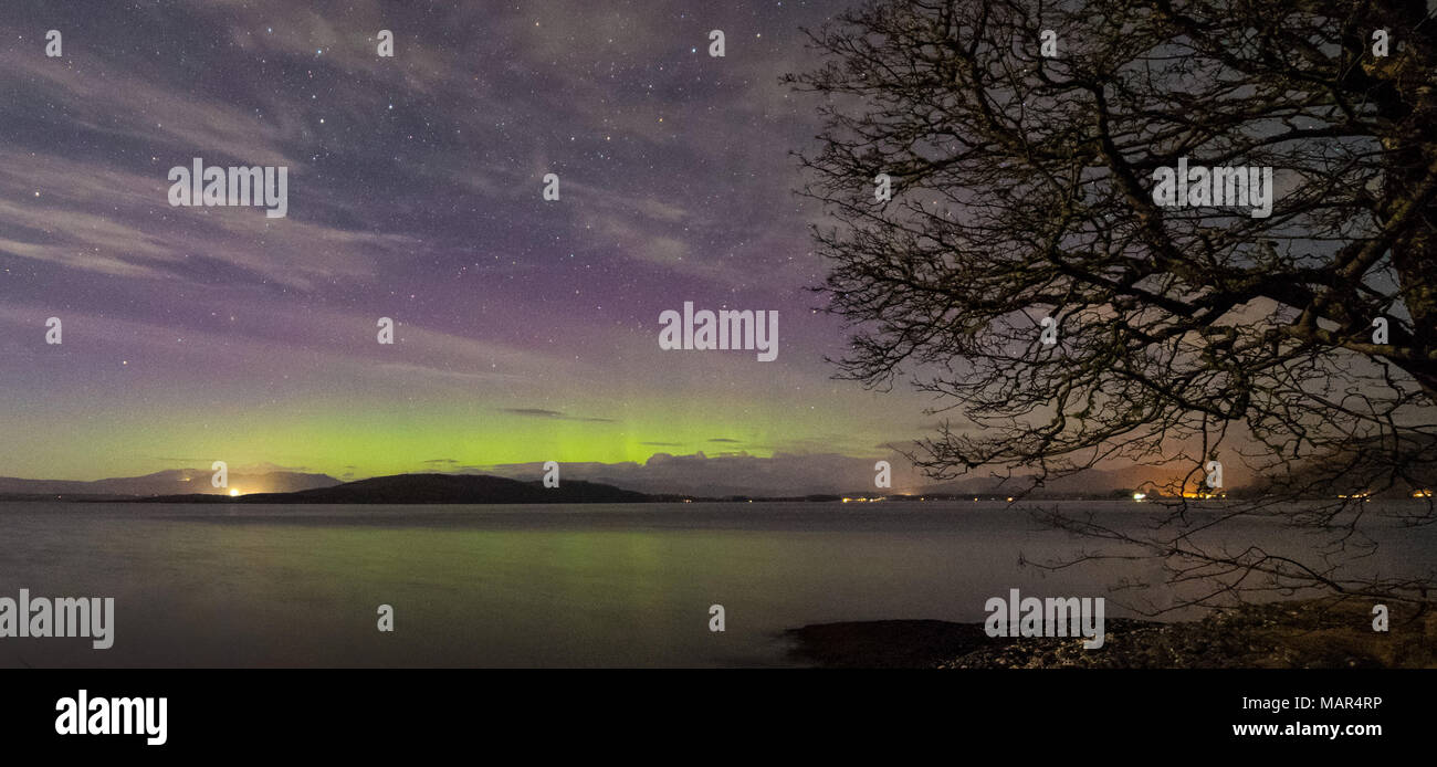 Northern Lights viewed at Ganavan Sands near Oban on the West Coast of Scotland in November 2017 Stock Photo