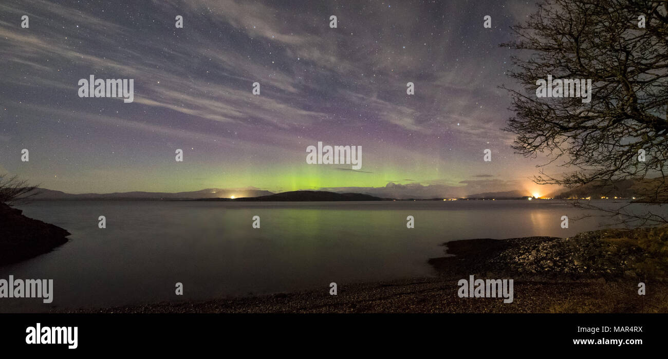 Northern Lights viewed at Ganavan Sands near Oban on the West Coast of Scotland in November 2017 Stock Photo