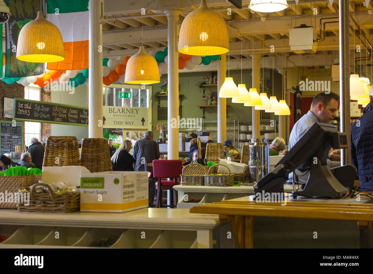 16 March 2018 The warm lit interior of the large restaurant mainly used by tourists to the village of Blarney in County Cork Ireland Stock Photo