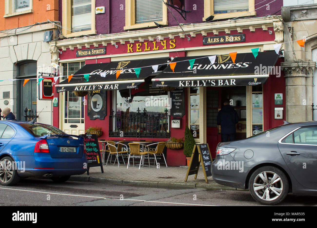 Cobh County Cork ireland The entrance doorway to Kelly's Bar a traditional Irish Pub on the main street of the town Stock Photo