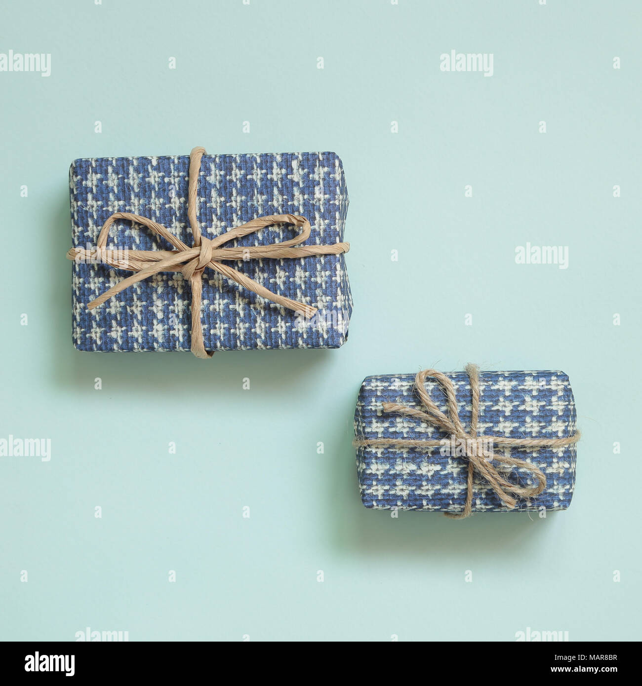 Gift boxes isolated on light green background Stock Photo