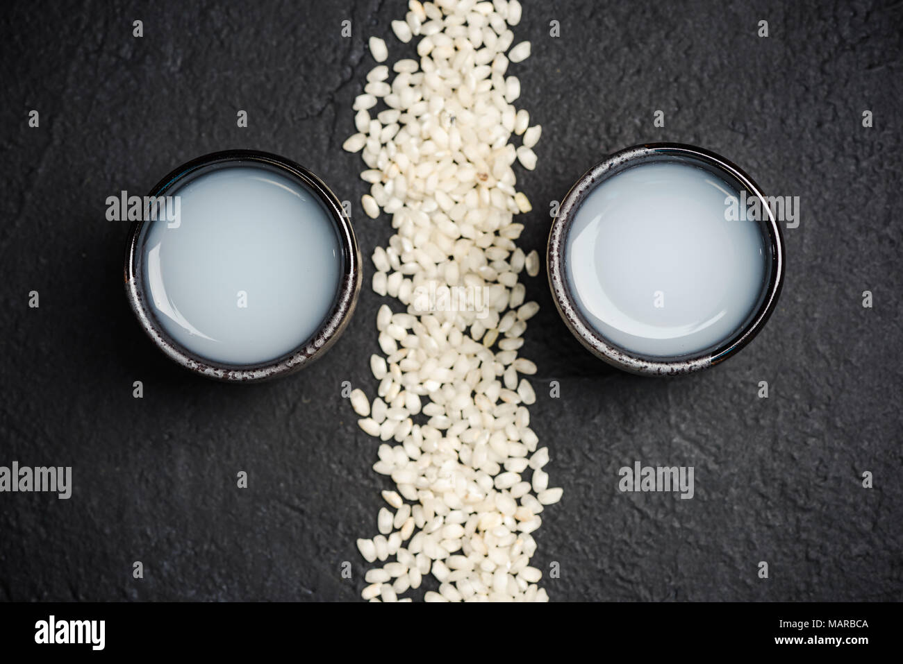 Japanese sake vodka and rice,copy space Stock Photo Alamy