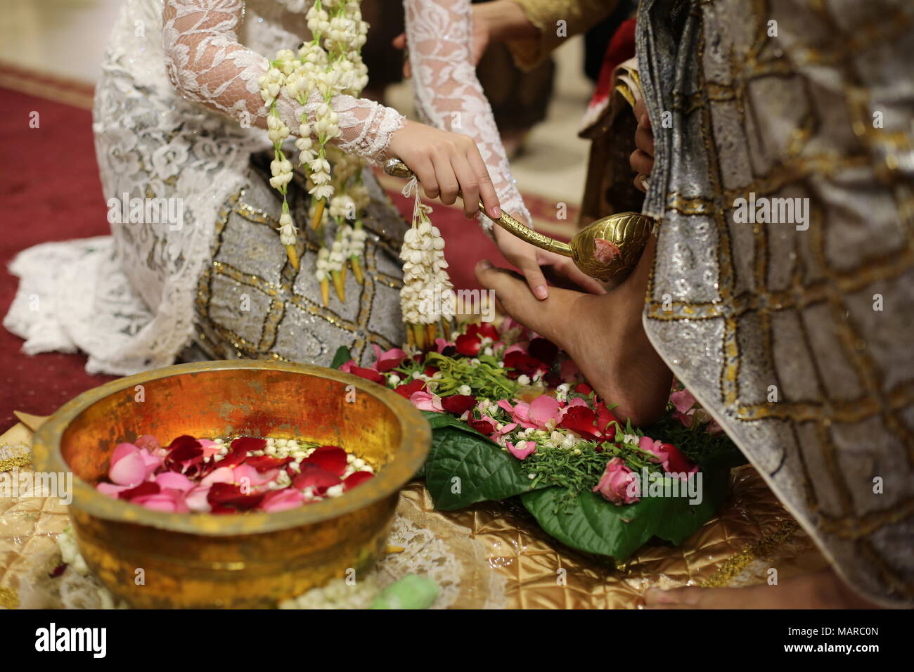 Washing Groom’s Feet Traditional Indonesian Javanese Wedding Ceremony