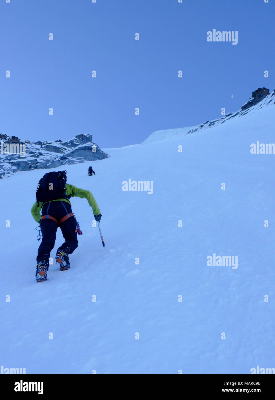 mountain climber on a steep north face on Gran Paradiso in the Italian Alps  Stock Photo - Alamy