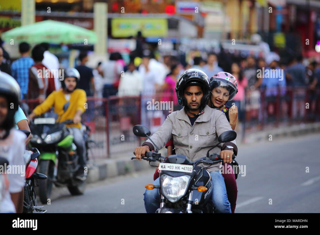 Bangalore, India October 16, 2016 Unknown married couples riding on