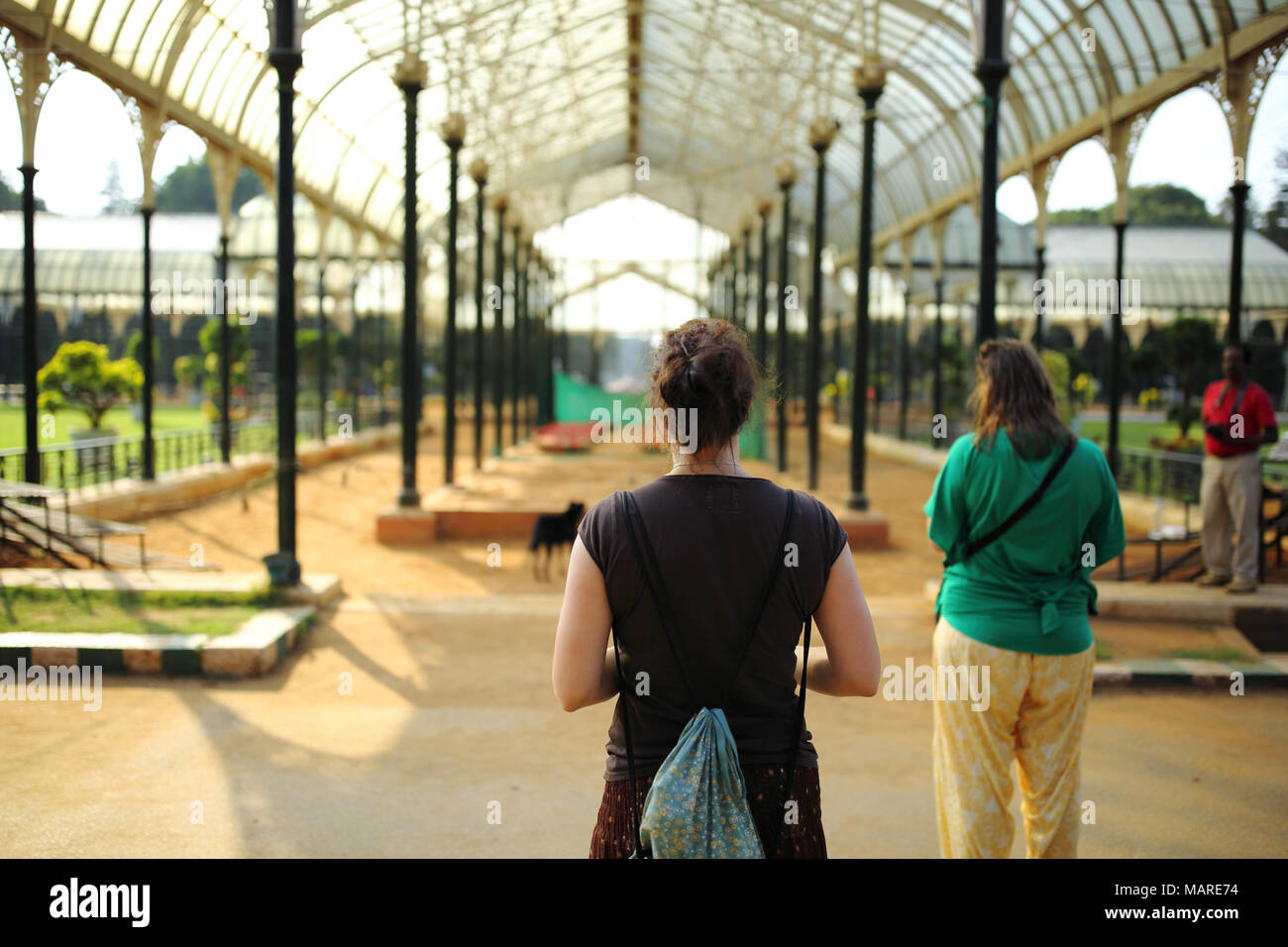 Bangalore, India - October 15, 2016: Tourists visits the botanical garden 'Lalbagh', looking at popular Glass House, that was built in 1889 CE. Stock Photo