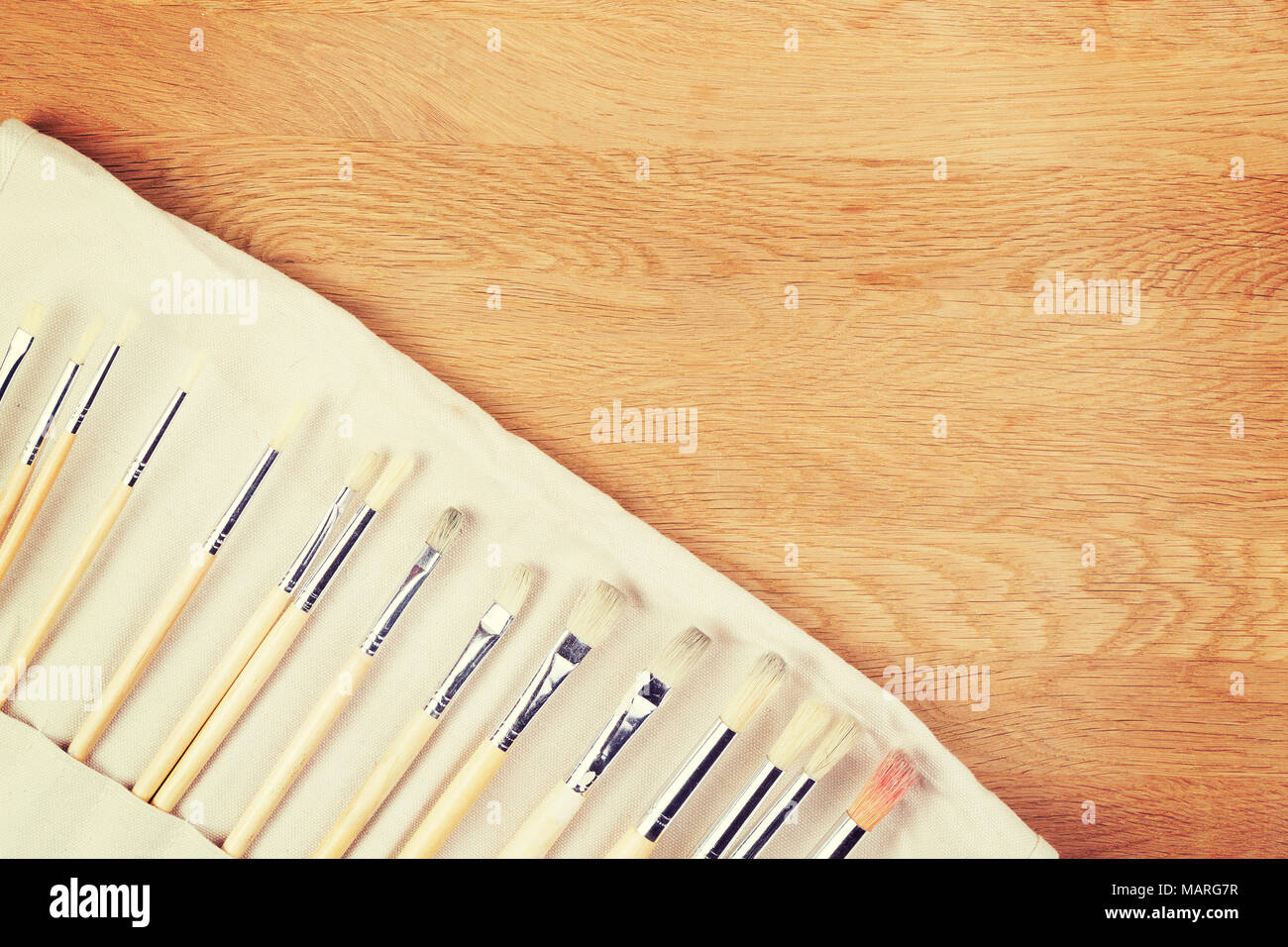 Set of paint brush on wooden background Stock Photo - Alamy