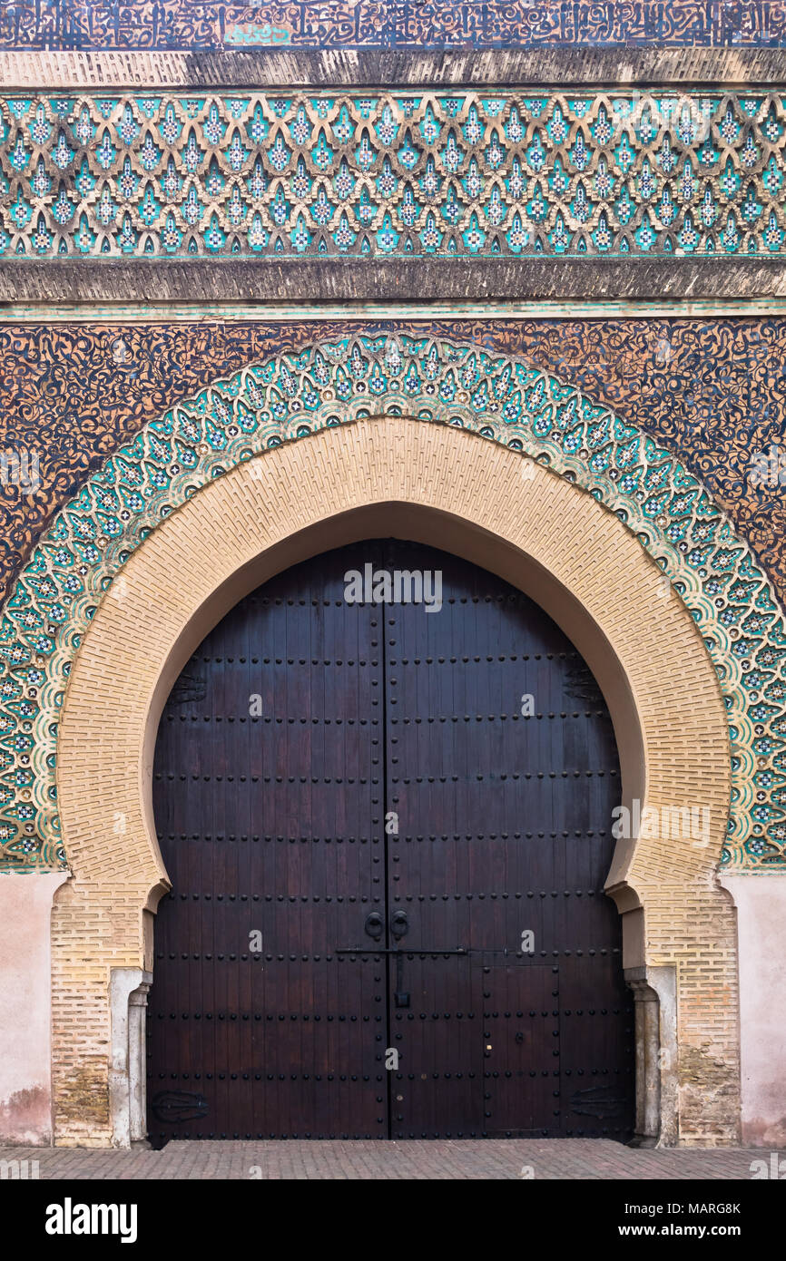 Bab Mansour Gate at El Hedime square, decorated with mosaic ceramic tiles, in Meknes, Morocco Stock Photo