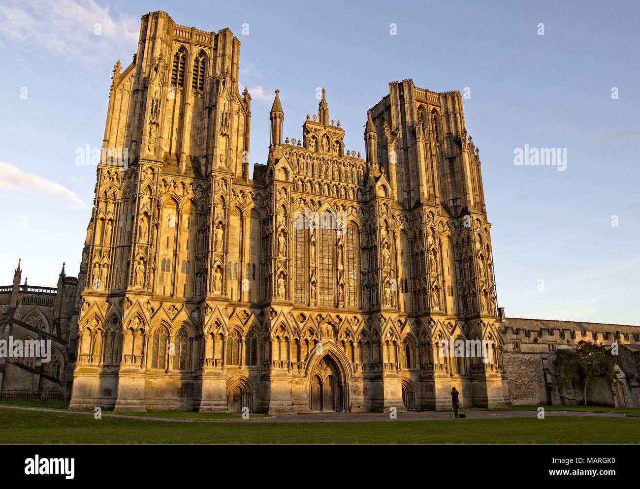 A view of the west front of Wells Cathedral at sunset. Stock Photo