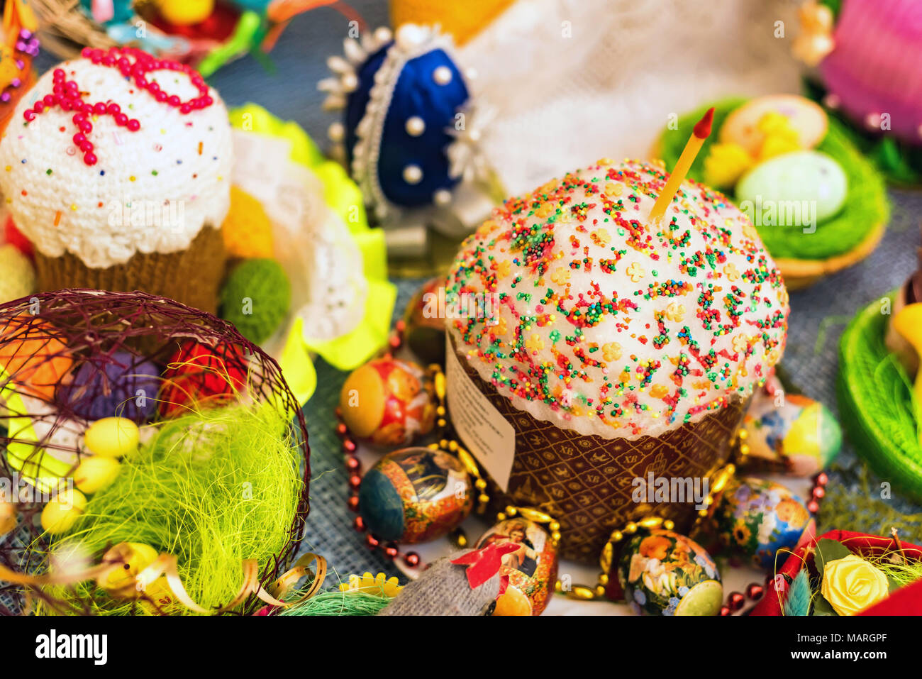 Easter cakes and painted eggs in the basket Stock Photo