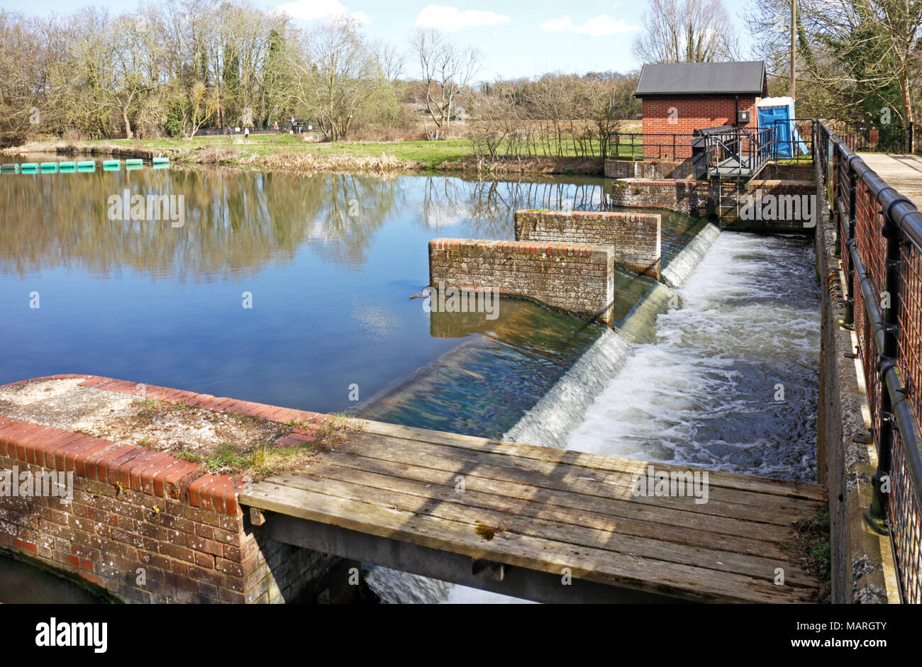 A view of the River Bure entering the remains of the former watermill at Horstead, Norfolk, England, United Kingdom, Europe. Stock Photo
