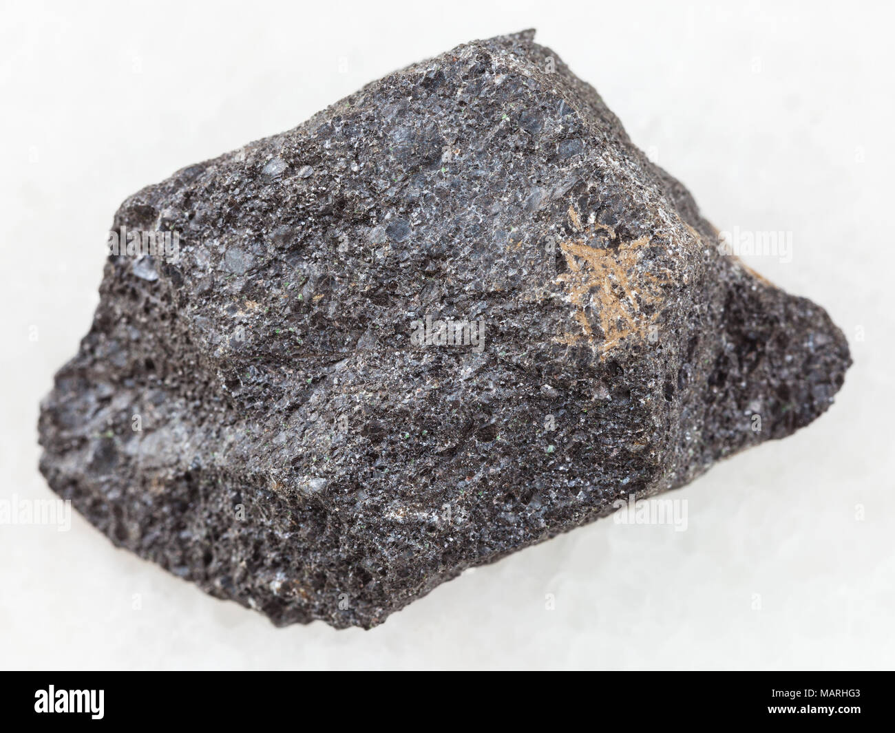 macro shooting of natural mineral rock specimen - rough chromite stone ...