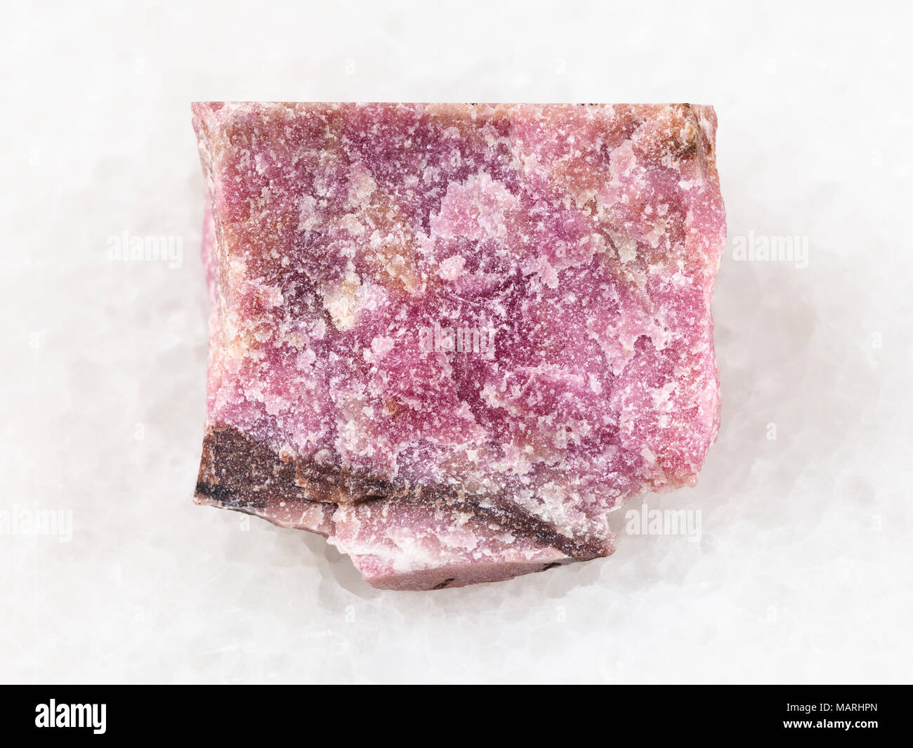 macro shooting of natural mineral rock specimen - raw rhodonite stone ...