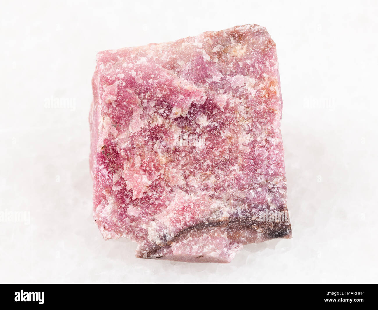 macro shooting of natural mineral rock specimen - rough rhodonite stone ...