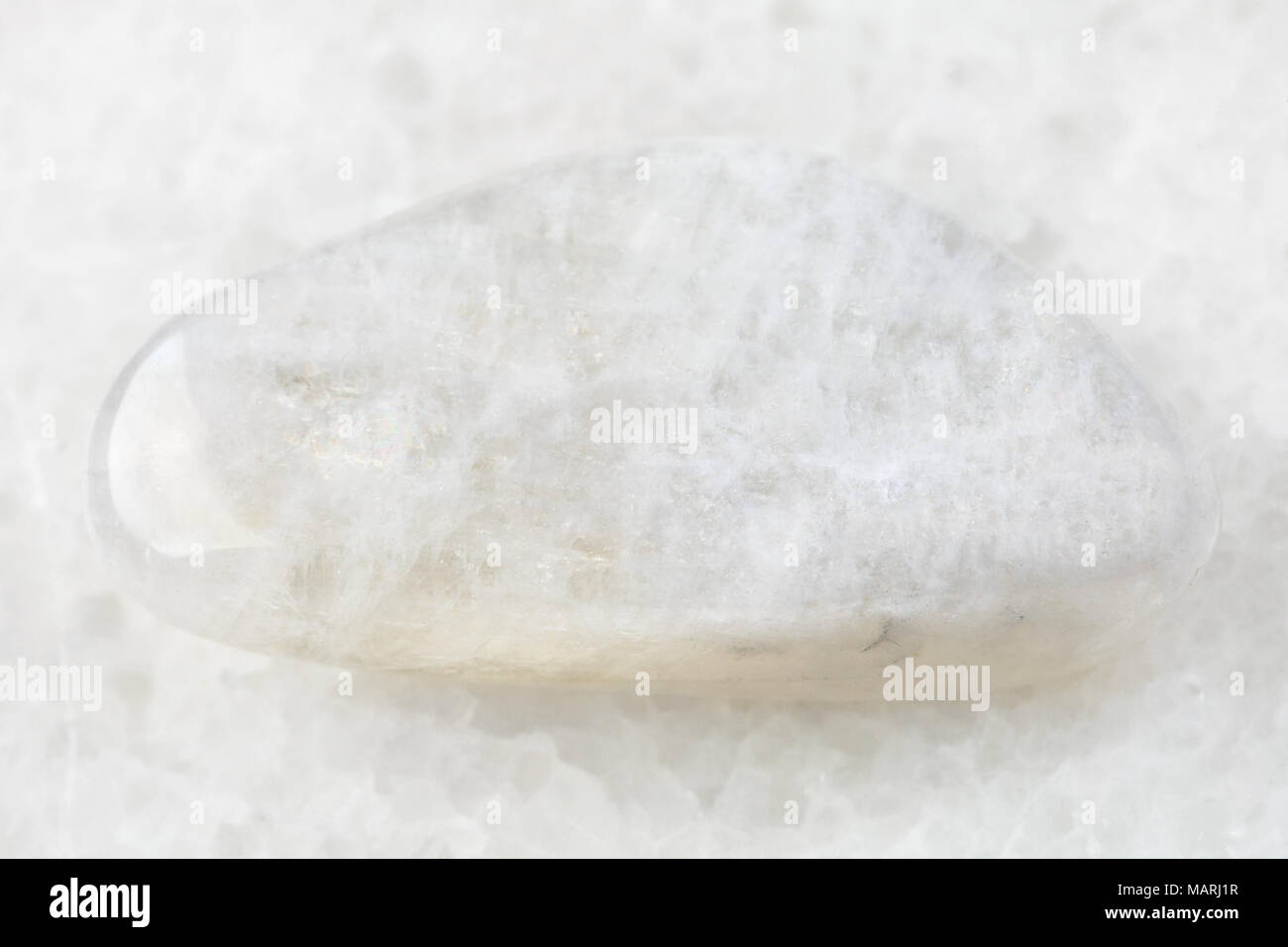 macro shooting of natural mineral rock specimen - white moonstone ...