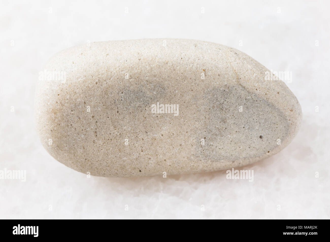 macro shooting of natural mineral rock specimen - tumbled white ...